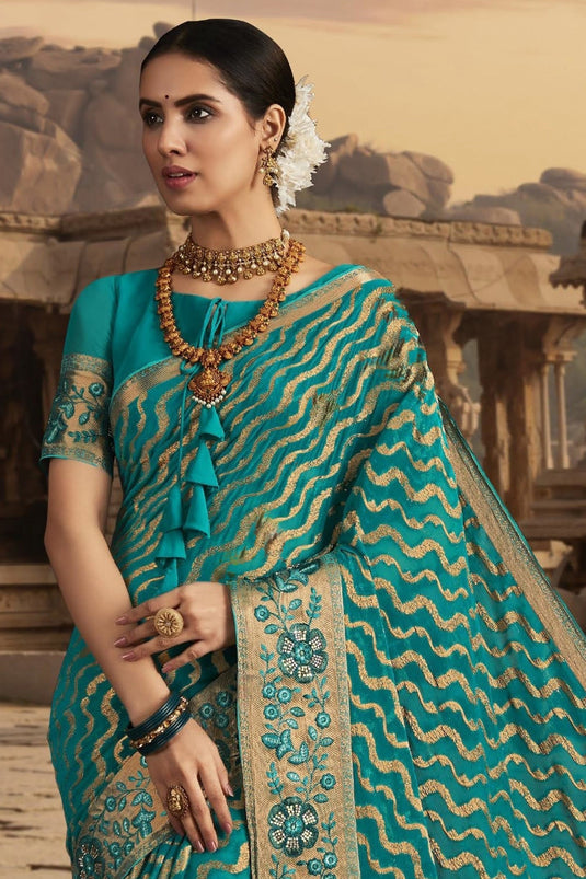 Entrancing Chiffon Fabric Saree In Cyan Color With Border Work