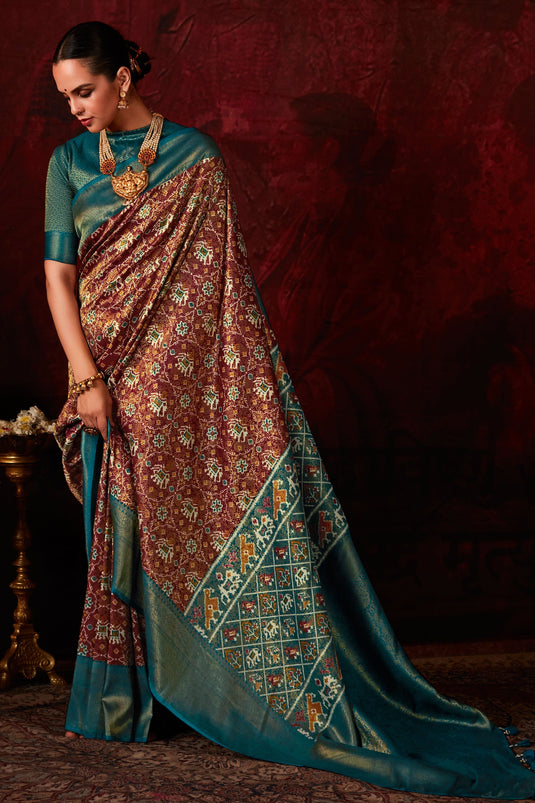 Attractive Patola Style Printed Silk Saree In Brown Color