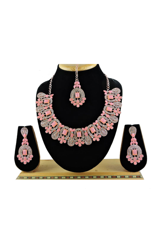 Beguiling Pink Color Alloy Material Necklace With Earrings And Mang Tikka