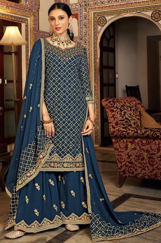 Embroidered Sangeet Wear Palazzo Salwar Kameez In Chinon Fabric Navy Blue Color