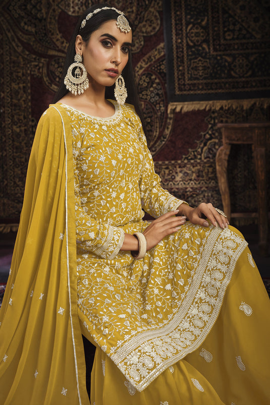 Fancy Embroidered Function Wear Palazzo Salwar Suit In Yellow Color