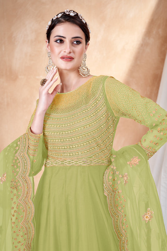 Green Color Festive Wear Anarkali Salwar Kameez In Net Fabric