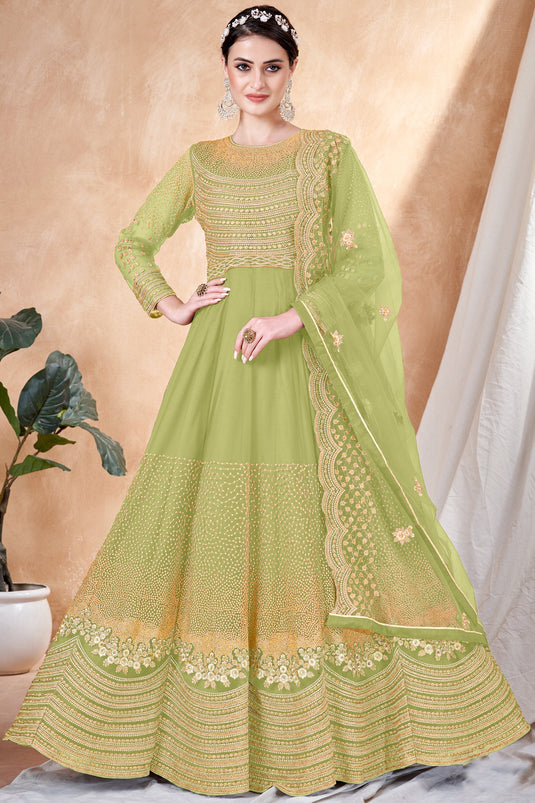 Green Color Festive Wear Anarkali Salwar Kameez In Net Fabric