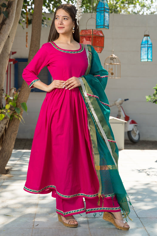 Engaging Rani Color Cotton Fabric Readymade Suit With Fancy Work