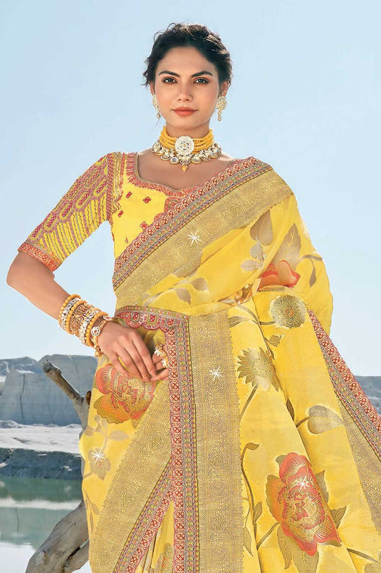 Trendy Silk Fabric Yellow Color Wedding Wear Saree