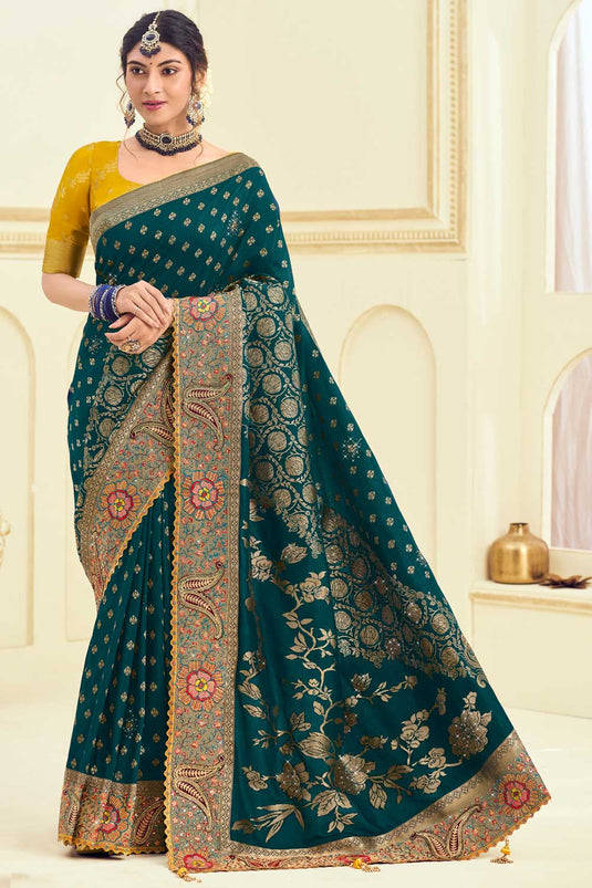 Attractive Weaving Designs Silk Saree In Teal Color