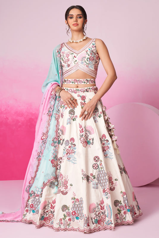 Sequins Work Silk Wedding Wear Lehenga In Cream With Ravishing Blouse