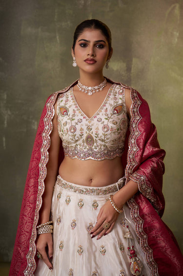 Off White Wedding Wear Tissue Embroidered Lehenga Choli With Dupatta
