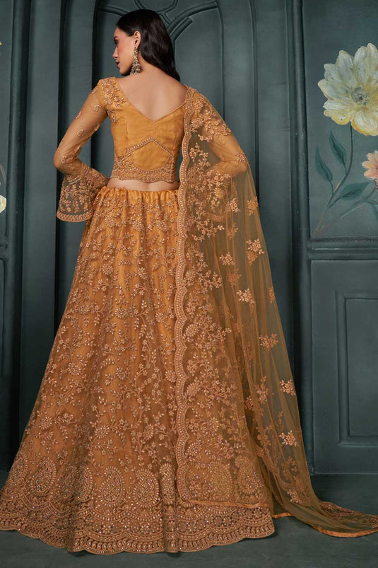 Attractive Wedding Wear Orange Color Net Fabric Lehenga