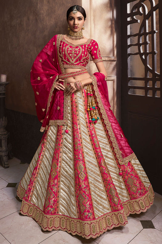 Multi Color Charming Silk Fabric Bridal Lehenga With Embroidered Work