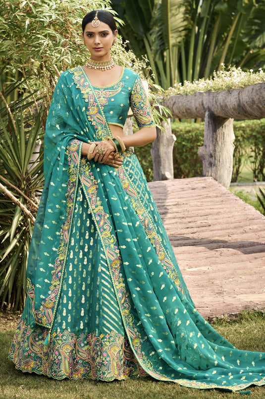 Jacquard Work On Sea Green Color Banarasi Silk Fabric Princely Lehenga