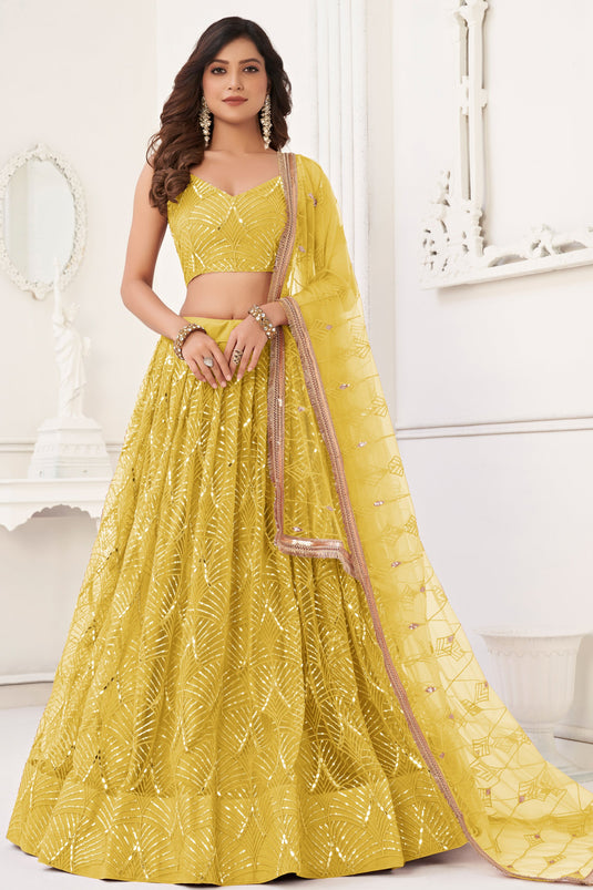 Function Wear Sequins Work Yellow Color Fashionable Lehenga In Net Fabric
