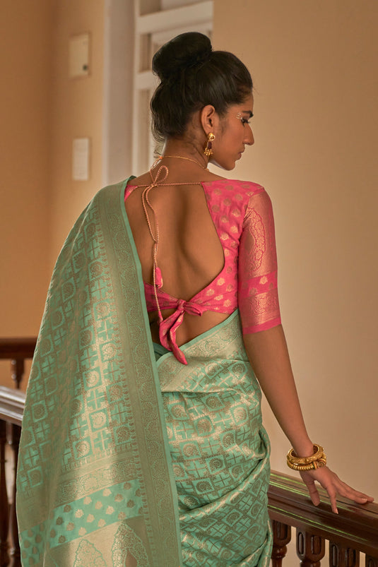 Appealing Weaving Work On Crepe Silk Fabric Saree In Sea Green Color