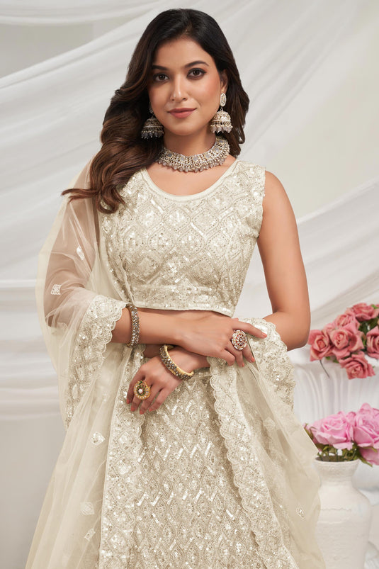 Ingenious Embroidered Cream Color Net Fabric Lehenga