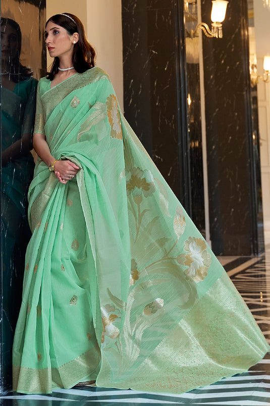 Kanika Dev Weaving Work Attractive Art Silk Saree In Sea Green Color