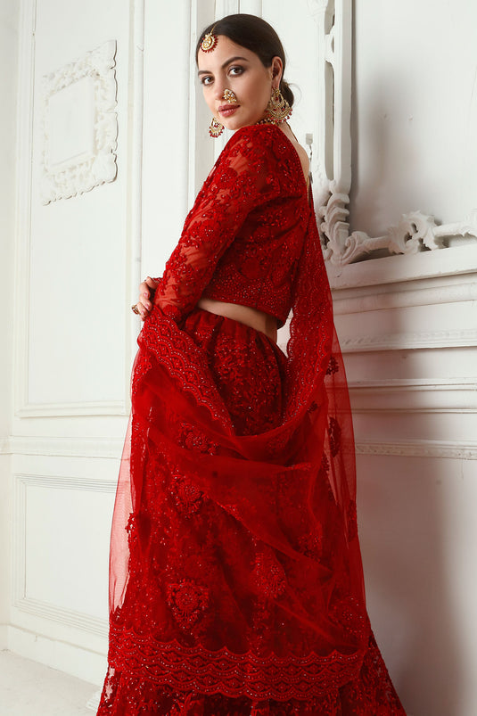 Creative Embroidery Work On Red Color Net Fabric Lehenga
