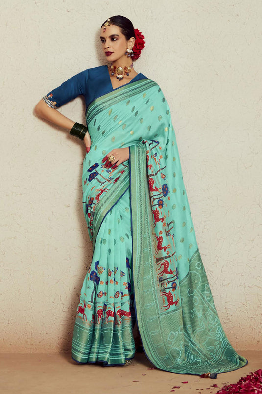 Weaving Work Attractive Brasso Fabric Saree In Light Cyan Color