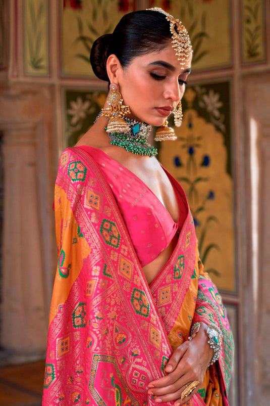 Art Silk Fabric Orange Color Saree With Winsome Patola Weaving Work
