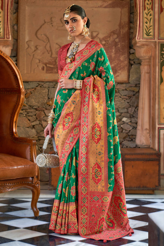 Creative Patola Weaving Work On Saree In Green Color Art Silk Fabric