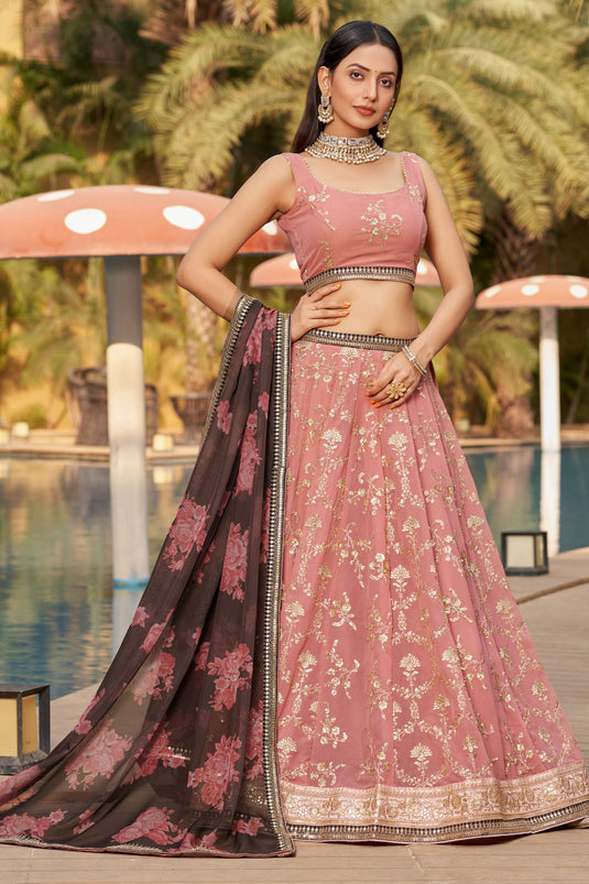 Radiant Sequins Embroidered Peach Color Georgette Fabric Lehenga