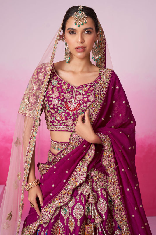 Mesmeric Burgundy Color Sequins Embroidered Bridal Lehenga In Silk Fabric