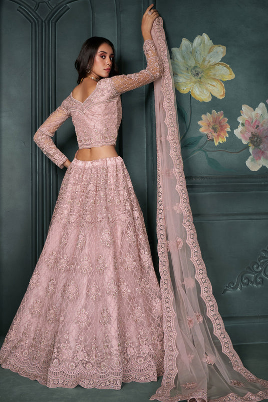 Amazing Embroidered Work On Pink Color Net Fabric Lehenga