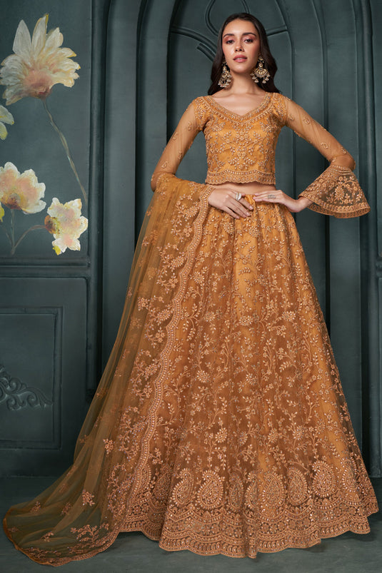 Trendy Net Fabric Orange Color Lehenga With Embroidered Work