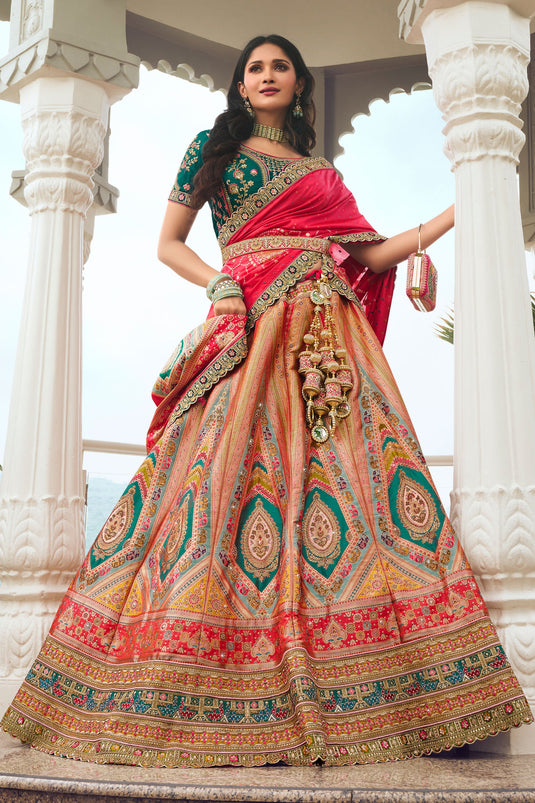 Glamorous Peach Color Silk Fabric Wedding Wear Bridal Lehenga