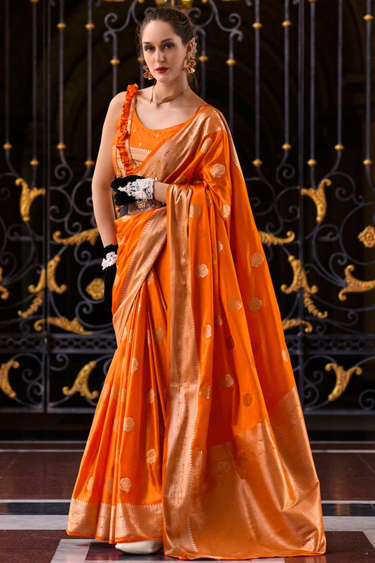 Remarkable Weaving Patterns on Orange Color Satin Silk Saree