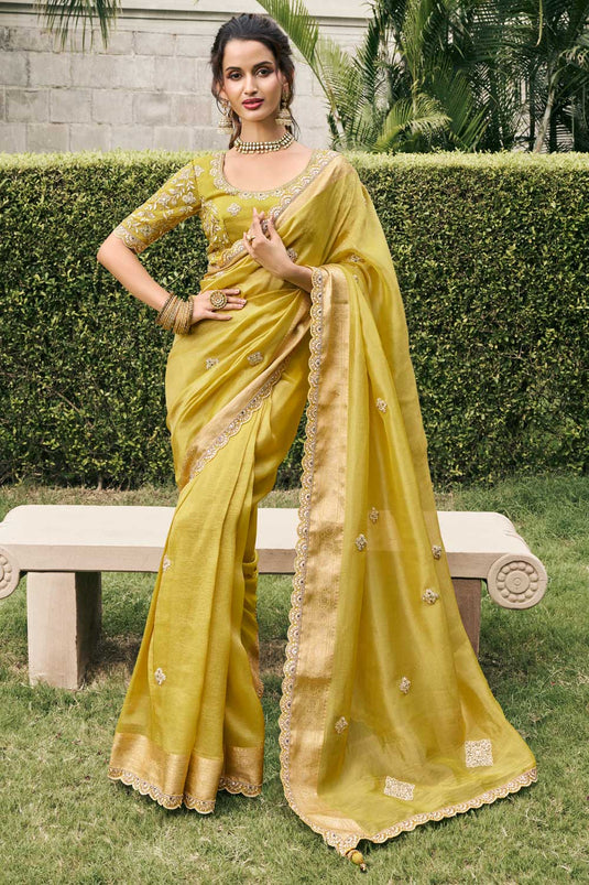 Tissue Silk Wedding Wear Mesmeric Saree In Golden Color