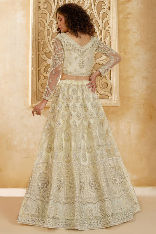 Lustrous Off White Heavy Embroidery Net Designer Lehenga Choli