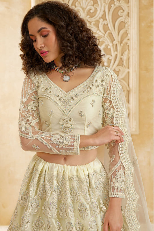 Lustrous Off White Heavy Embroidery Net Designer Lehenga Choli