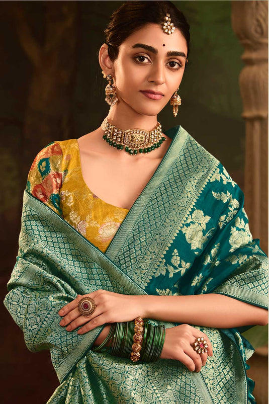 Teal Color Crepe Silk Fabric Engaging Saree With Weaving Work