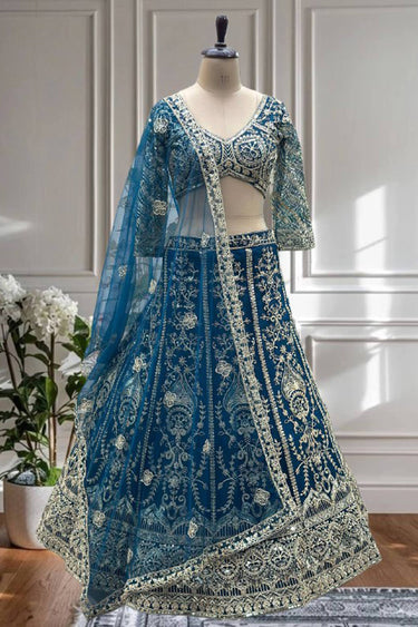 Embroidered Function Wear Net Lehenga Choli In Blue Color