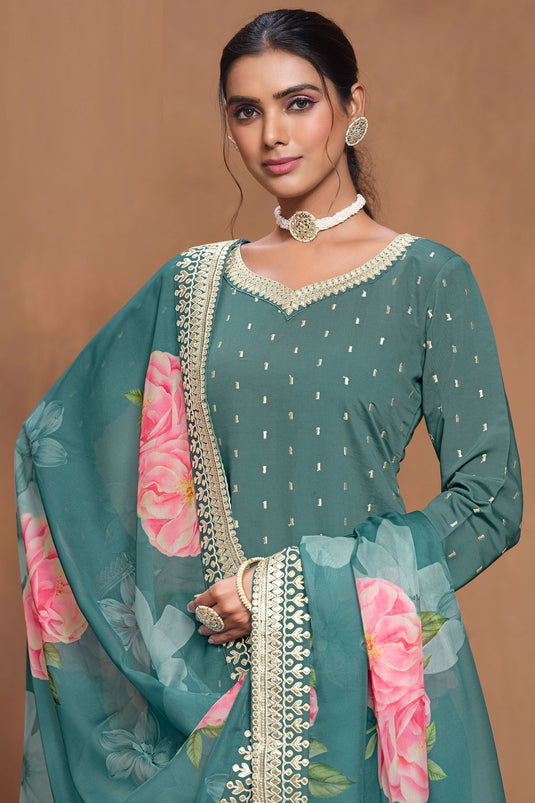 Engaging Teal Color Art Silk Fabric Palazzo Suit With Floral Design Dupatta