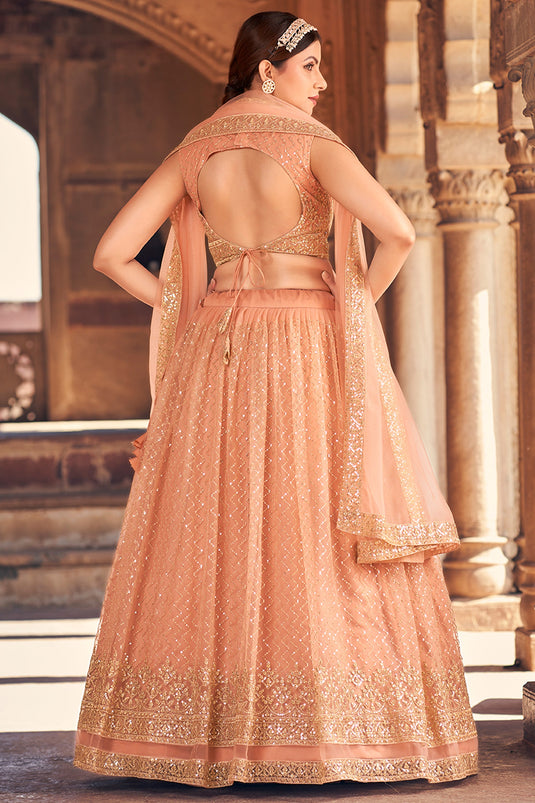 Peach Color Function Wear Net Fabric Incredible Lehenga