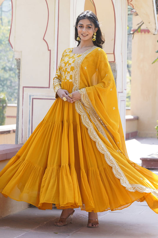 Enticing Yellow Color Viscose Fabric Readymade Gown With Dupatta