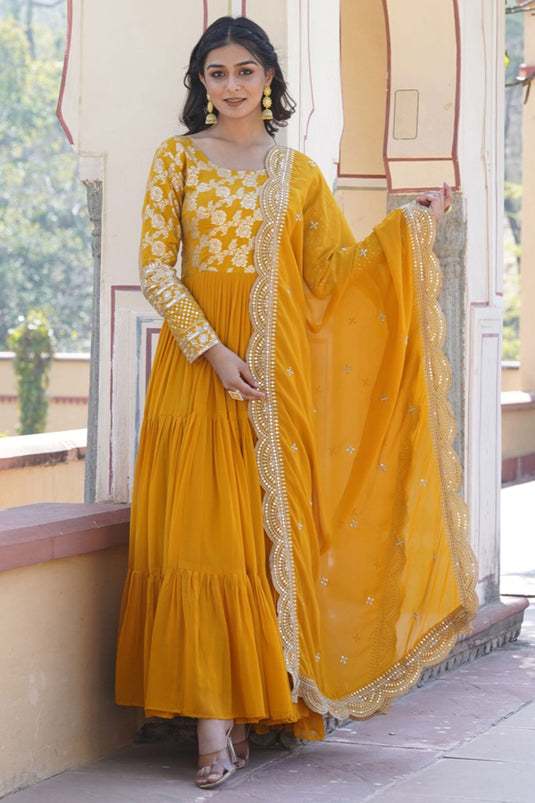 Enticing Yellow Color Viscose Fabric Readymade Gown With Dupatta