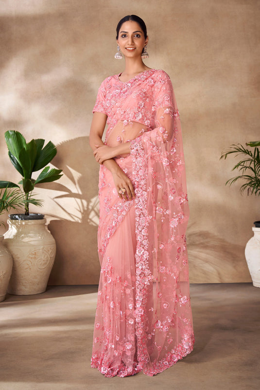 Tempting Net Fabric Peach Color Saree With Sequins Work