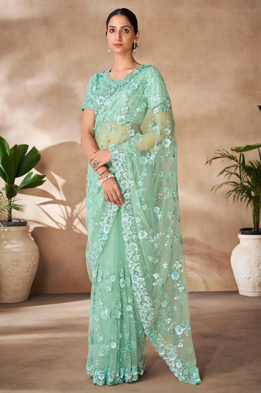 Engaging Sea Green Color Net Fabric Saree With Sequins Work