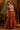 Vibrant Rust Mul Cotton Hand Work Designer Gown For Women