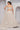 Off White Color Net Fabric Coveted Lehenga With Sequins Work