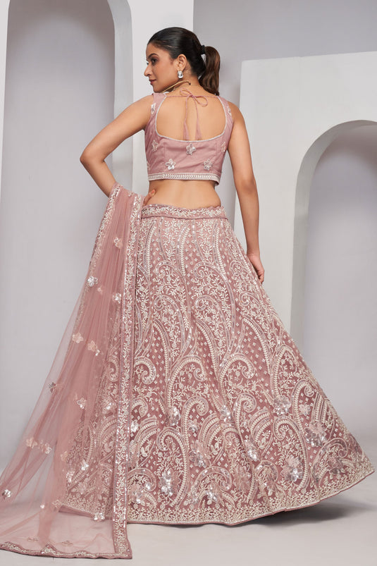 Tempting Net Fabric Pink Color Lehenga With Sequins Work