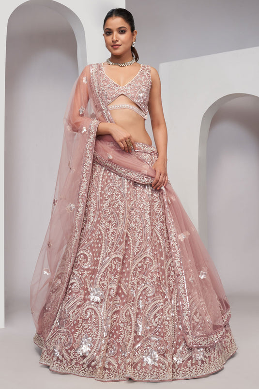 Tempting Net Fabric Pink Color Lehenga With Sequins Work