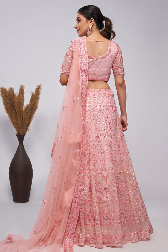 Trendy Net Fabric Pink Color Lehenga With Sequins Work