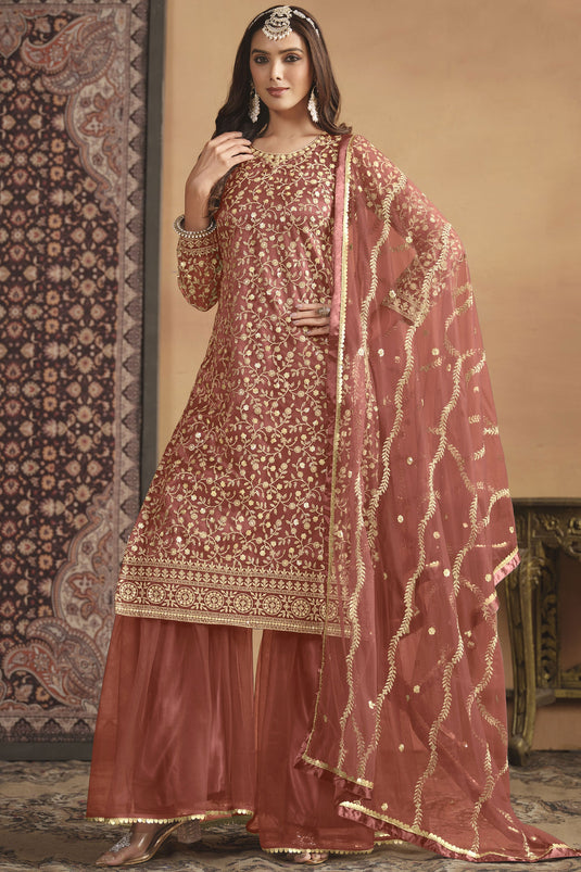 Imperial Peach Color Net Fabric Palazzo Suit In Festive Wear