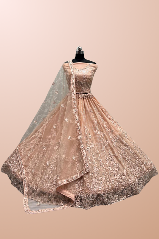 Peach Color Net Fabric Alluring Wedding Wear Bridal Lehenga