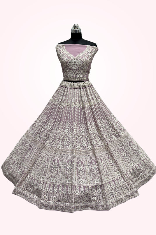 Embroidery Work Bridal Lehenga In Lavender Color Net Fabric With Blouse