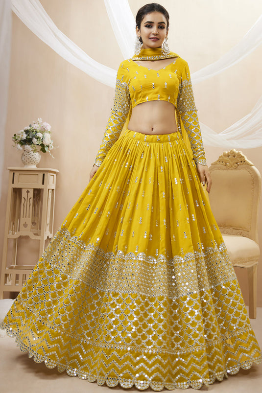 Embellished Embroidered Work On Yellow Color Georgette Fabric Lehenga Choli