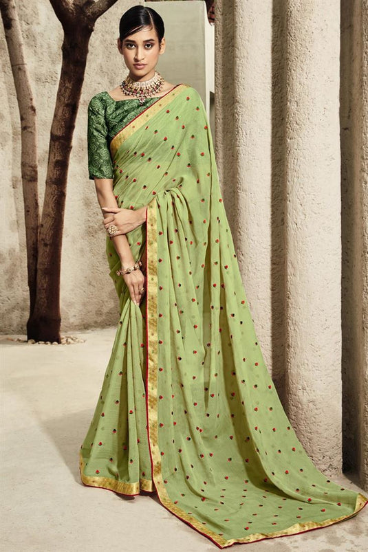 Stylish Floral Embroidered Chiffon Saree In Green Color